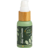 A Bit Hippy Day Serum 25ml is a green bottle with a bamboo cap and white pump, featuring natural, vegan labels—ideal for sensitive skin.