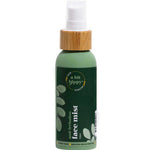 A Bit Hippy Face Mist 100ml stands upright on a white background, featuring a bamboo-look spray cap and leaf designs—a green, hydrating mist for sensitive skin and the perfect vegan skincare addition.