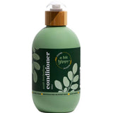 A Bit Hippy Sensitive Conditioner 500ml comes in a green bottle with a bamboo-colored pump, leaf illustrations, and plant-derived, vegan, irritation-free hair care claims—perfect for sensitive scalps.