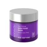A purple jar of Andalou Age Defying Avo Cocoa Skin Food Mask 50g with a silver lid offers a deeply hydrating face mask experience, featuring Fruit Stem Cell Science for age-defying skincare.