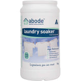 A white container of Abode Laundry Soaker High Performance with a blue label showing laundry on a clothesline. The text highlights plant-based, high-performance cleaning and powerful stain removal for up to 33 washes.