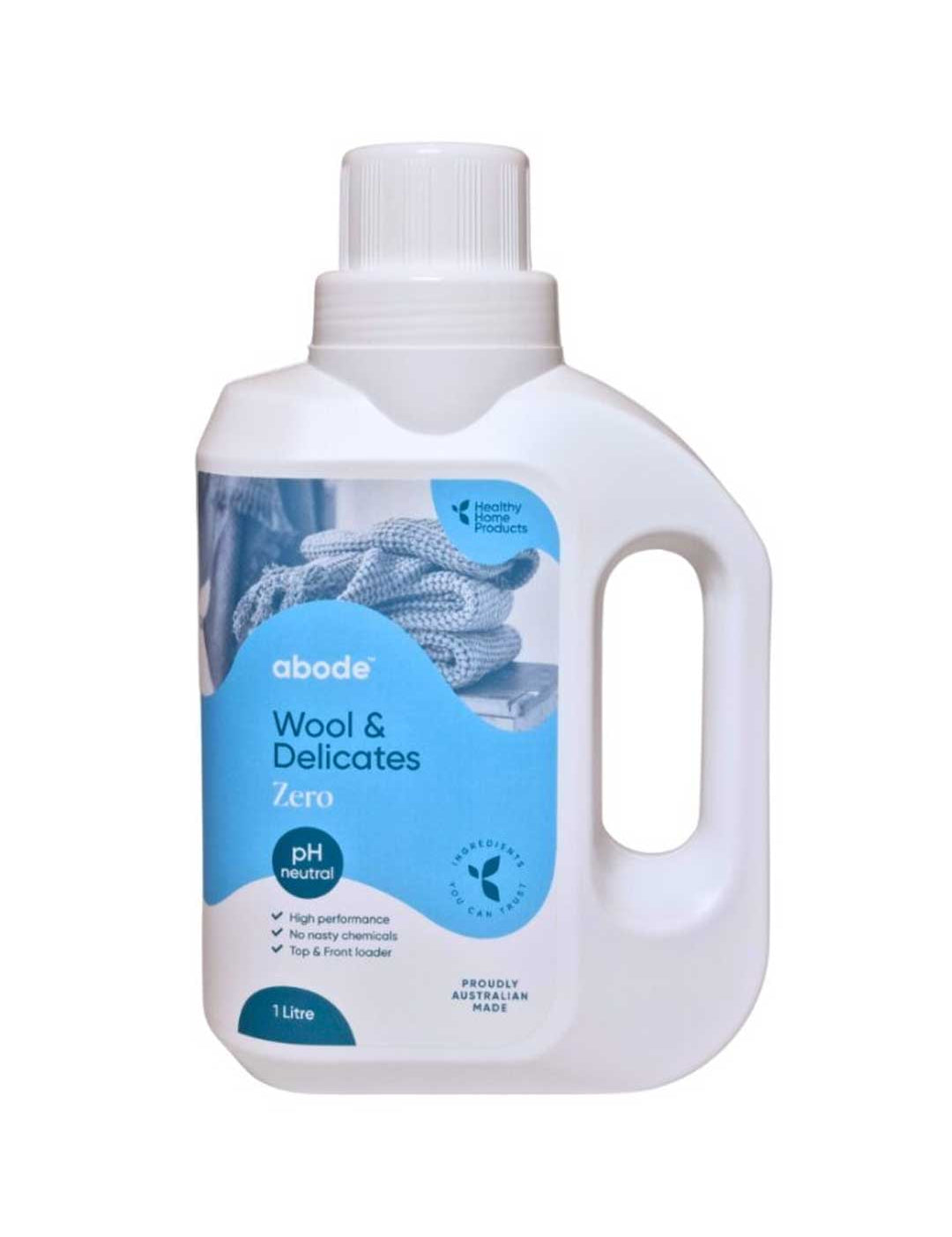 A white 1L bottle of Abode Wool & Delicates Laundry Liquid Zero (Fragrance Free) with a blue label and knitted fabric image. This pH neutral detergent is ideal for washing wool and delicate fabrics.