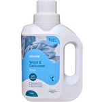 A white 1L bottle of Abode Wool & Delicates Laundry Liquid Zero (Fragrance Free) with a blue label and knitted fabric image. This pH neutral detergent is ideal for washing wool and delicate fabrics.