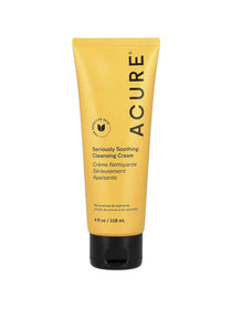 A yellow tube of Acure Seriously Soothing Cleansing Cream 118ml for sensitive skin, with black text and a black flip cap. This gentle natural cleanser contains peony extract and chamomile.
