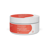 A white jar with a red lid and label reading "Amazing You Fix My Face Magnesium Moisturiser 100g." This skincare product helps reduce fine lines and target pigmentation for smoother skin.