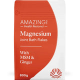 A white and orange pouch labeled Amazing You Joint Magnesium Flakes 800g features a wavy design that highlights benefits like joint support and muscle relaxation for a calming bath soak.