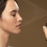 Model misting her face with Antipodes Ananda Ultra-Hydrating Calming Mist