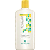 An 11.5 fl oz (340 mL) white bottle of Andalou Naturals Brilliant Shine Sunflower & Citrus Conditioner features a yellow cap and a colorful square design on the front label.