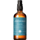 A brown Antipodes Ananda H₂O Ultra-Hydrating Calming Mist 100ml spray bottle with a teal label, black pump, and white text. This antioxidant-rich mist contains black fern and raspberry seed for soothing skincare.