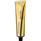 A metallic gold tube of Antipodes Aura Gold Manuka Honey Radiance Mask 75ml with a black cap stands upright against a white background—the ideal brightening face mask for radiant, hydrated skin.