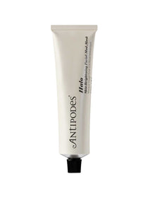 A white tube with a black cap, labeled Antipodes Halo Skin-Brightening Facial Mud Mask 75ml, stands upright against a plain background, ideal for oily, congested skin.