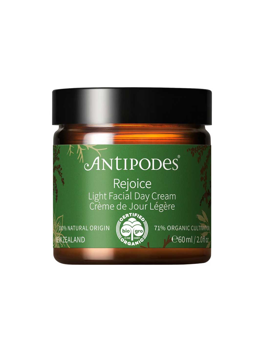 A 60ml brown jar of Antipodes Rejoice Light Facial Day Cream with a green label, featuring natural ingredients like manuka flower oil and organic avocado oil, plus certification details.