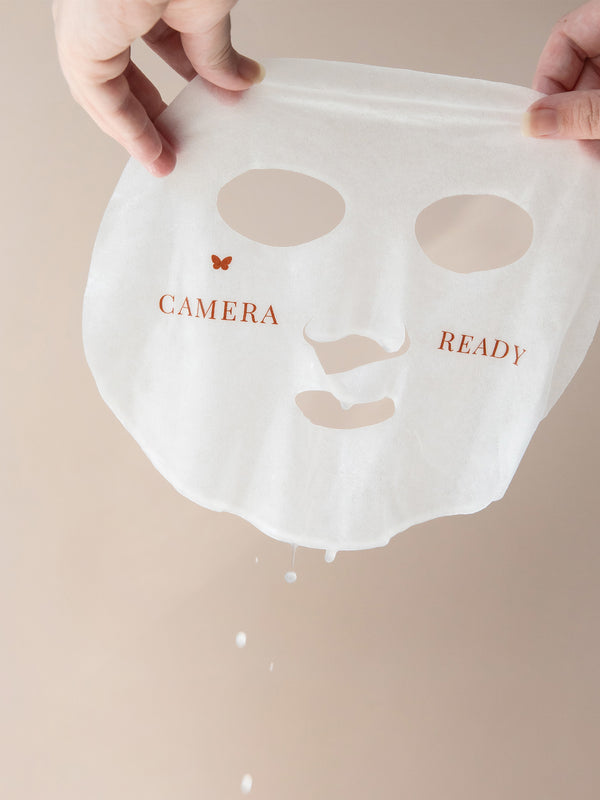 Vanessa Megan Copper and Vitamin C Illuminating Sheet Mask held up