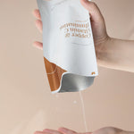 Serum from Vanessa Megan Copper and Vitamin C Sheet Mask poured onto a hand