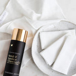 Vanessa Megan Neroli and Squalane Cleansing Oil with a face towel