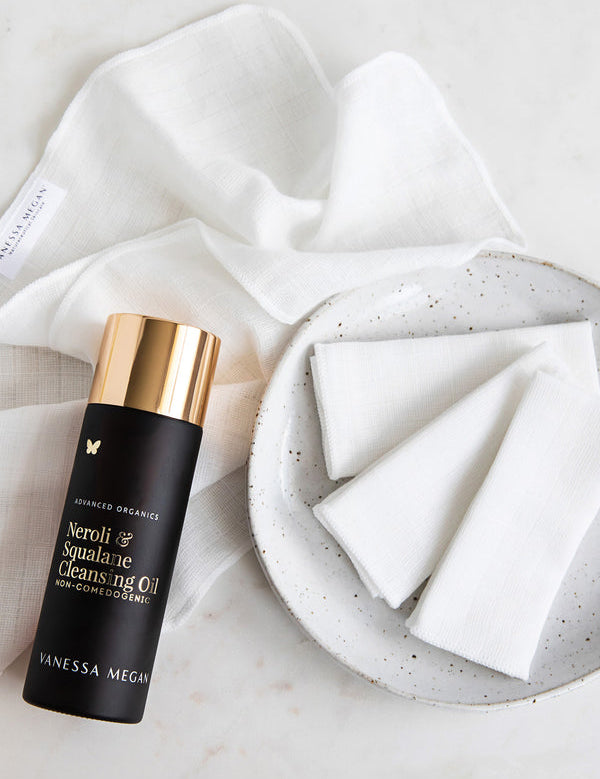 Vanessa Megan Neroli and Squalane Cleansing Oil with a face towel