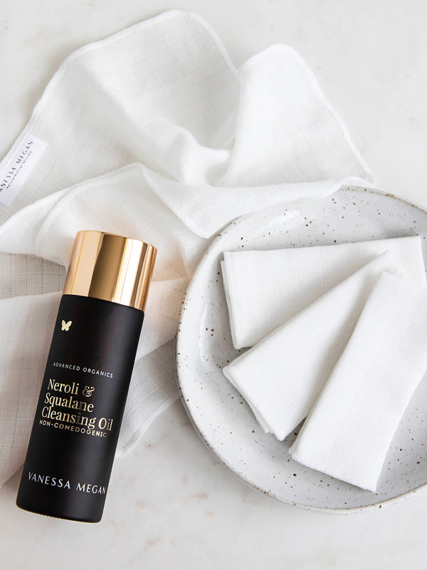 Vanessa Megan Neroli and Squalane Cleansing Oil with a face towel