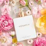 Vanessa Megan Monarch 100% Natural Perfume among fresh flowers