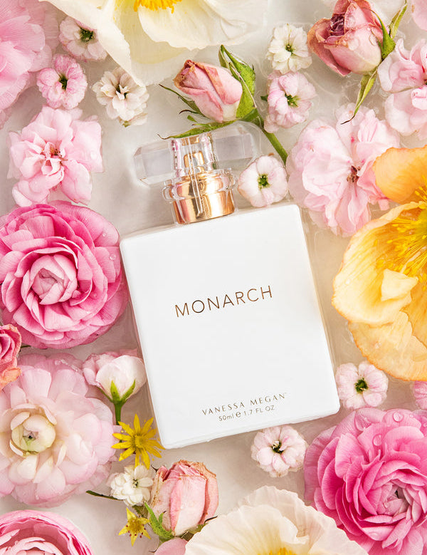 Vanessa Megan Monarch 100% Natural Perfume among fresh flowers