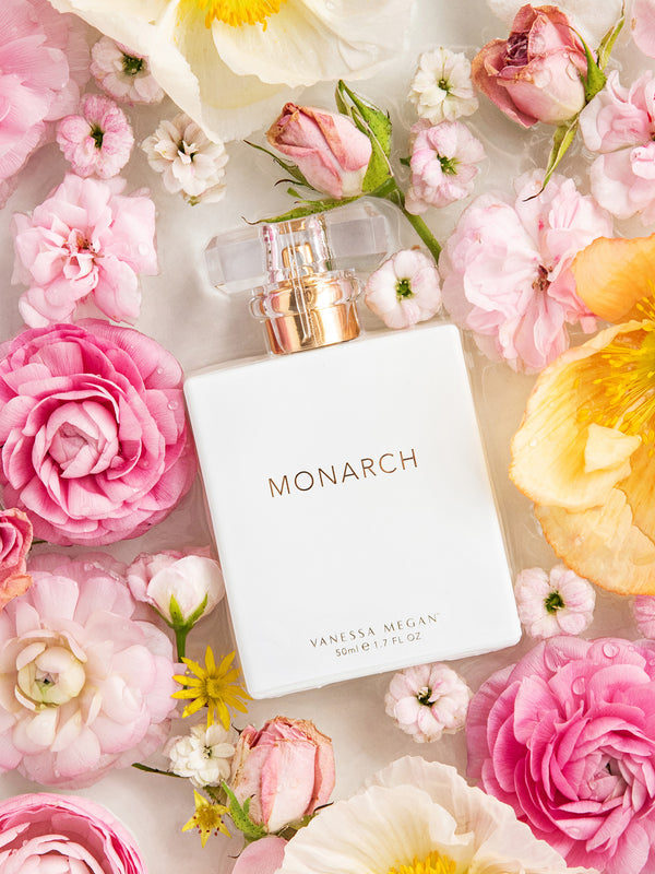 Vanessa Megan Monarch 100% Natural Perfume among fresh flowers