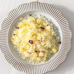 Bowl of Vanessa Megan Love Scrub with sea salt and rose petals