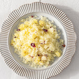 Bowl of Vanessa Megan Love Scrub with sea salt and rose petals