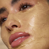 Model wearing Antipodes Aura Gold Manuka Honey Radiance Mask