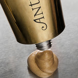 Golden mask texture from the tube of Antipodes Aura Gold Radiance Mask