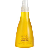 A yellow bottle of The Jojoba Company Australian Jojoba Oil for Face & Body with a clear pump dispenser and minimal, simple branding. Suitable for face, body, and hair—ideal for eczema-prone skin.