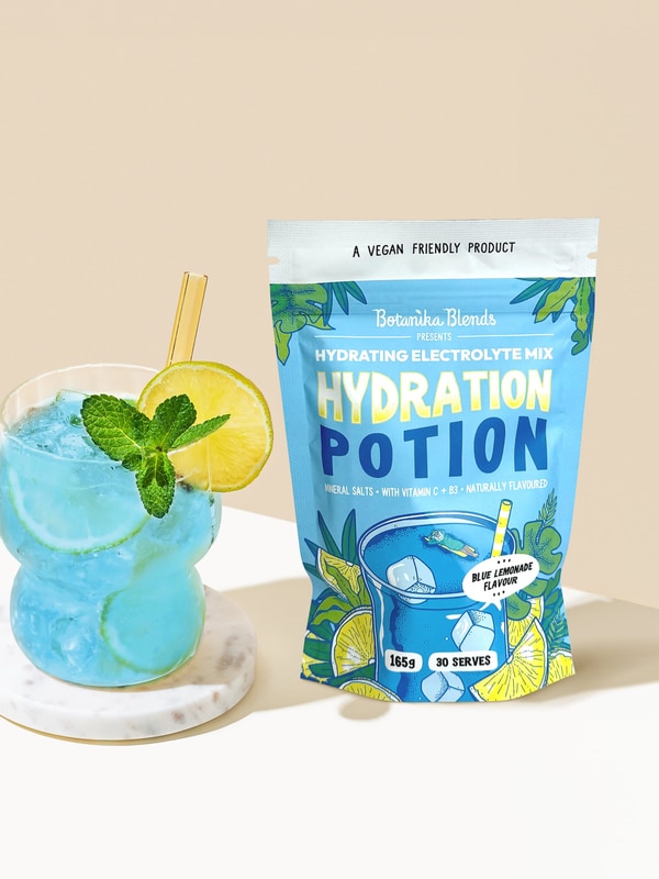 Botanika Blends Blue Lemonade Hydration Potion with prepared drink