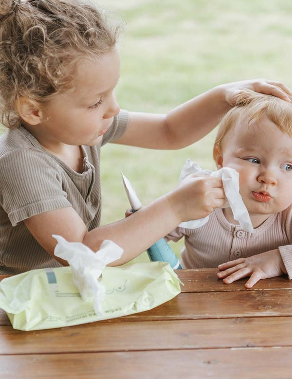 Wotnot Natural Baby Wipes being used gently on a baby