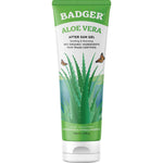 A 118ml tube of Badger Aloe Vera Gel with a green cap, aloe vera plant graphics, butterflies, and text noting organic ingredients, fair trade certification, vegan, cruelty-free, unscented and hypoallergenic skin hydration benefits.