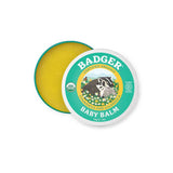 Badger Baby Balm 56g comes in a round tin with a badger illustration on the lid, featuring yellow balm made with chamomile and calendula—perfect for soothing nappy rash and gentle organic baby skin care.