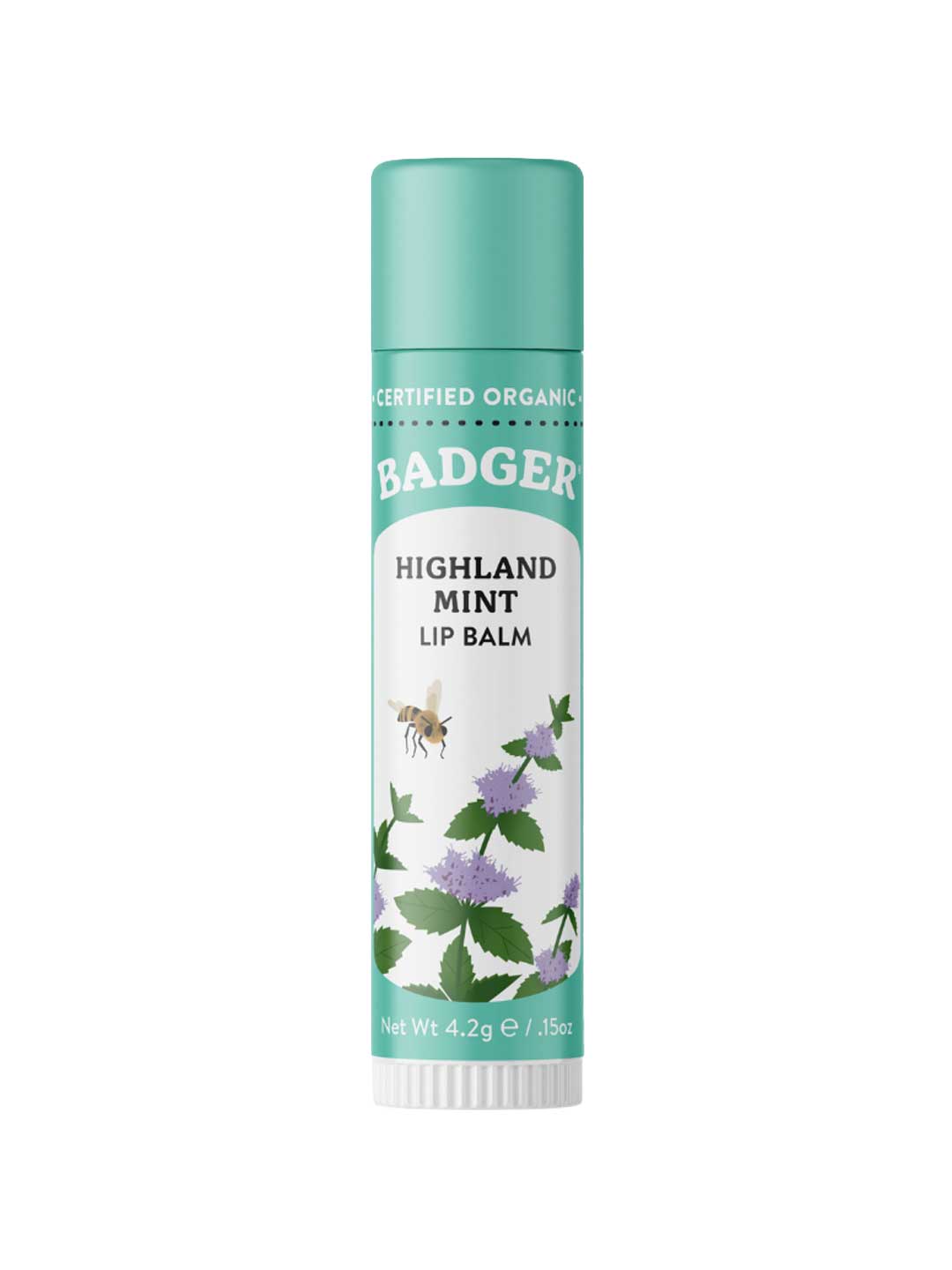A 4.2g tube of Badger Lip Balm Highland Mint with a green cap features Certified Organic labeling, illustrations of mint leaves, purple flowers, and a bee. This refreshing mint balm hydrates and soothes your lips.