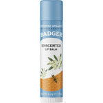 A tube of Badger Lip Balm Unscented 4.2g with a blue cap and label, ideal for sensitive skin. The packaging features olive branches, a honeycomb pattern, a bee, and text: "Certified Organic" and "Net Wt 4.2g / .15oz.