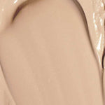 A smooth, creamy beige substance—like Hyaluronic Anti-Pollution CC Cream SPF15 40ml—spread across a surface with the text Colour: Beige at the bottom.