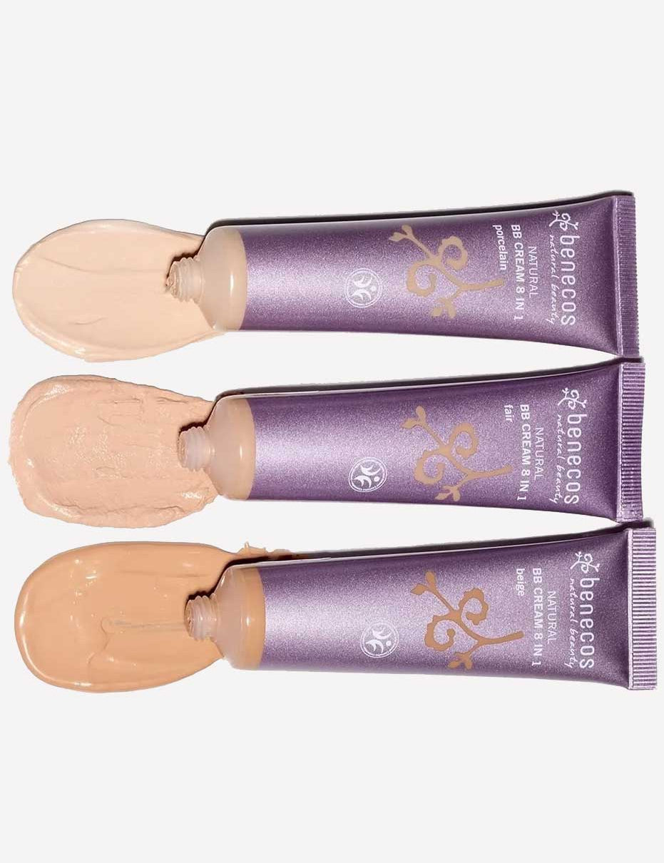 Three purple tubes of Benecos BB Cream 30ml are shown with swatches in three different shades spread out against a white background.