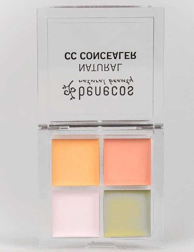 The Benecos CC Palette 6g features four square pastel concealer creams—yellow, peach, lavender, and green—in a clear compact with an open lid and black text, ideal for natural colour-correcting coverage.