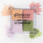 The Benecos CC Palette 6g, a colour-correcting concealer with four pastel cream shades—peach, pink, purple, and green—is displayed in a clear case with matching swatches on a white background. Ideal for natural makeup looks.