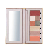 The Benecos Large Beauty ID Palette - Empty is an open, customizable makeup palette with a left-side mirror and space for eight rectangular shades, plus slots for two small applicators beside the shades.