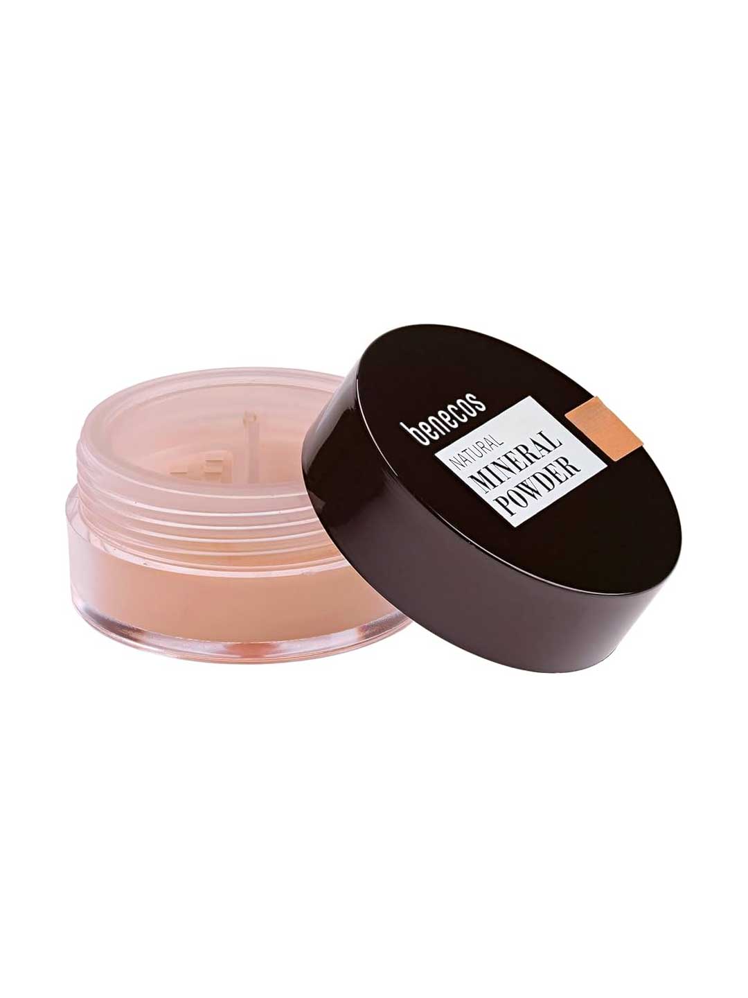 An open container of Benecos Natural Mineral Powder 10g with a black lid beside it. The light beige, talc-free loose powder provides a matte finish. The lid’s label is partially visible.