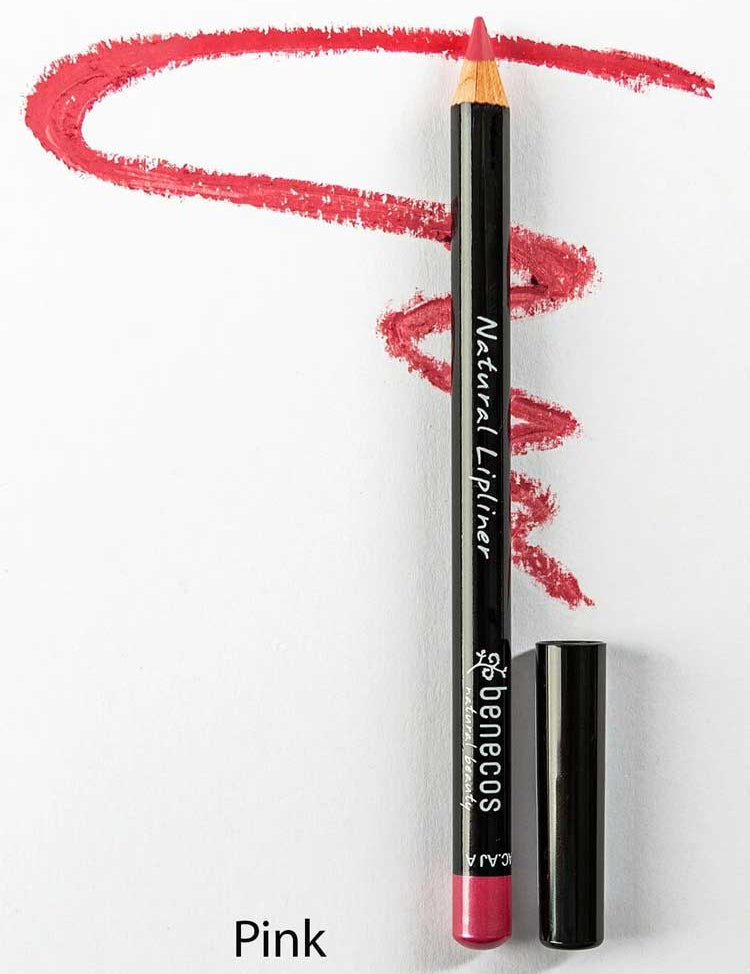 A Benecos Natural Lipliners 1.13g pencil with a pink shade and black cap lies on white paper, labeled "Natural Lipliner." A pink squiggle is drawn above, and the word "Pink" appears below.