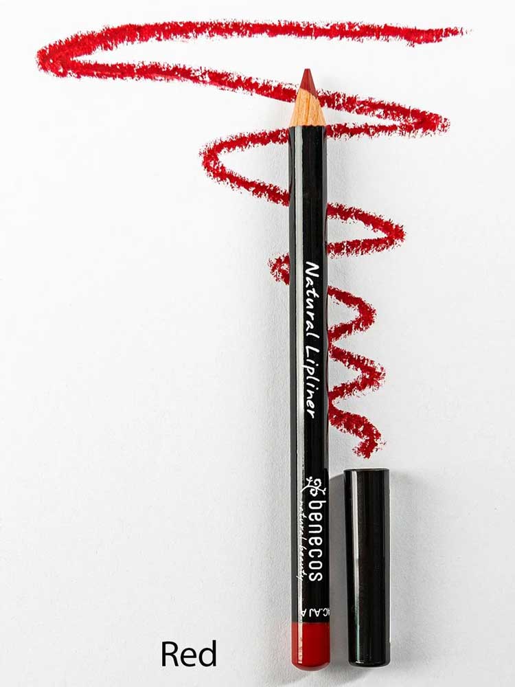 A Benecos Natural Lipliners 1.13g pencil with its cap off lies on white paper, displaying a wavy red line above it and the word "Red" printed at the bottom left of the image.