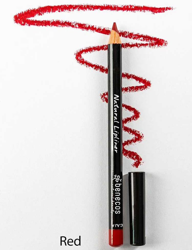 A Benecos Natural Lipliners 1.13g pencil with its cap off lies on white paper, displaying a wavy red line above it and the word "Red" printed at the bottom left of the image.