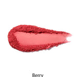 A swatch of 100% Pure Fruit Pigmented® Blush 9g from 100% Pure, in a berry shade, is smeared in an oval with a textured edge and smooth center on a white background, labeled “Berry” underneath.