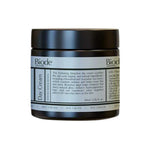 A 50ml (1.76 fl. oz.) black jar of Biode Day Cream with Sea Moss and Alfalfa, featuring a white label with product info, ingredients like sea moss, usage instructions, and a blue accent stripe near the bottom.