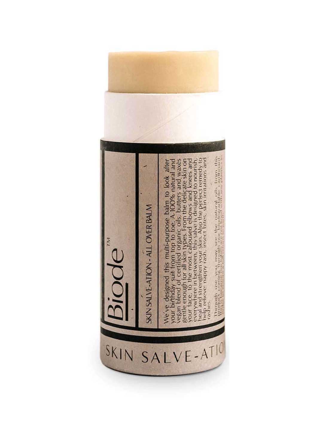 A cylindrical tube of Biode Salve-ation Multi-purpose Balm with a beige label and black text, showing the solid organic balm at the top. The minimal, eco-friendly packaging highlights Biode’s zero-waste skincare focus.