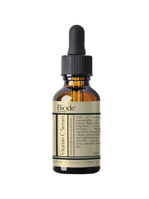 A brown glass dropper bottle labeled "Biode Vitamin C Serum with Fingerlime and Kakadu Plum 30ml," highlighting skin-brightening benefits and featuring Kakadu Plum among its ingredients.