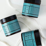 Biode Night Cream styled on white fabric