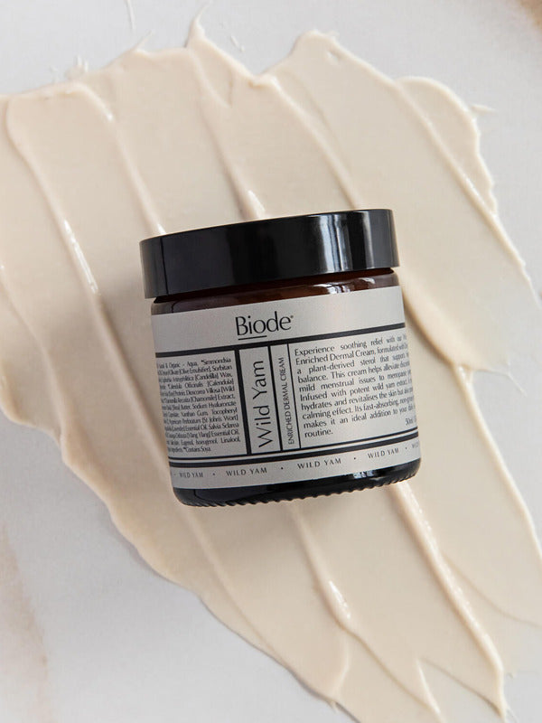 Biode Wild Yam Cream jar on cream texture
